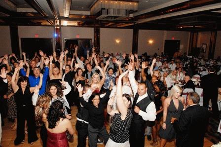corporate party pic with crowd cheering